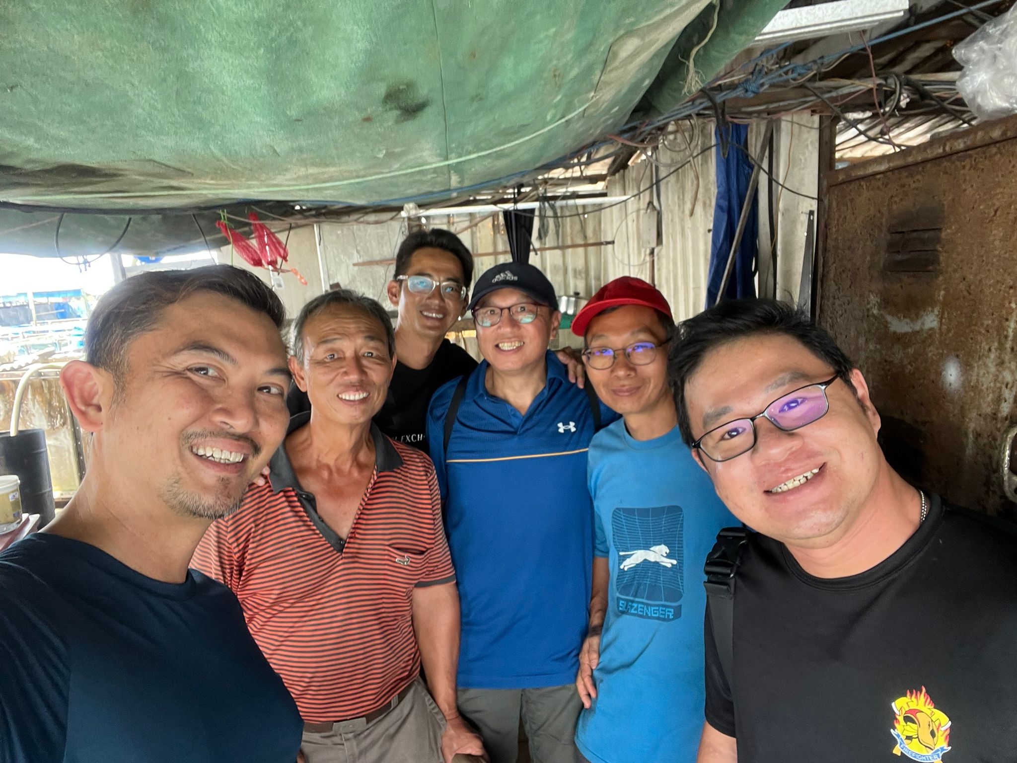 SAFEF (2) Mr Ken Cheong of SAFEF with local farmers