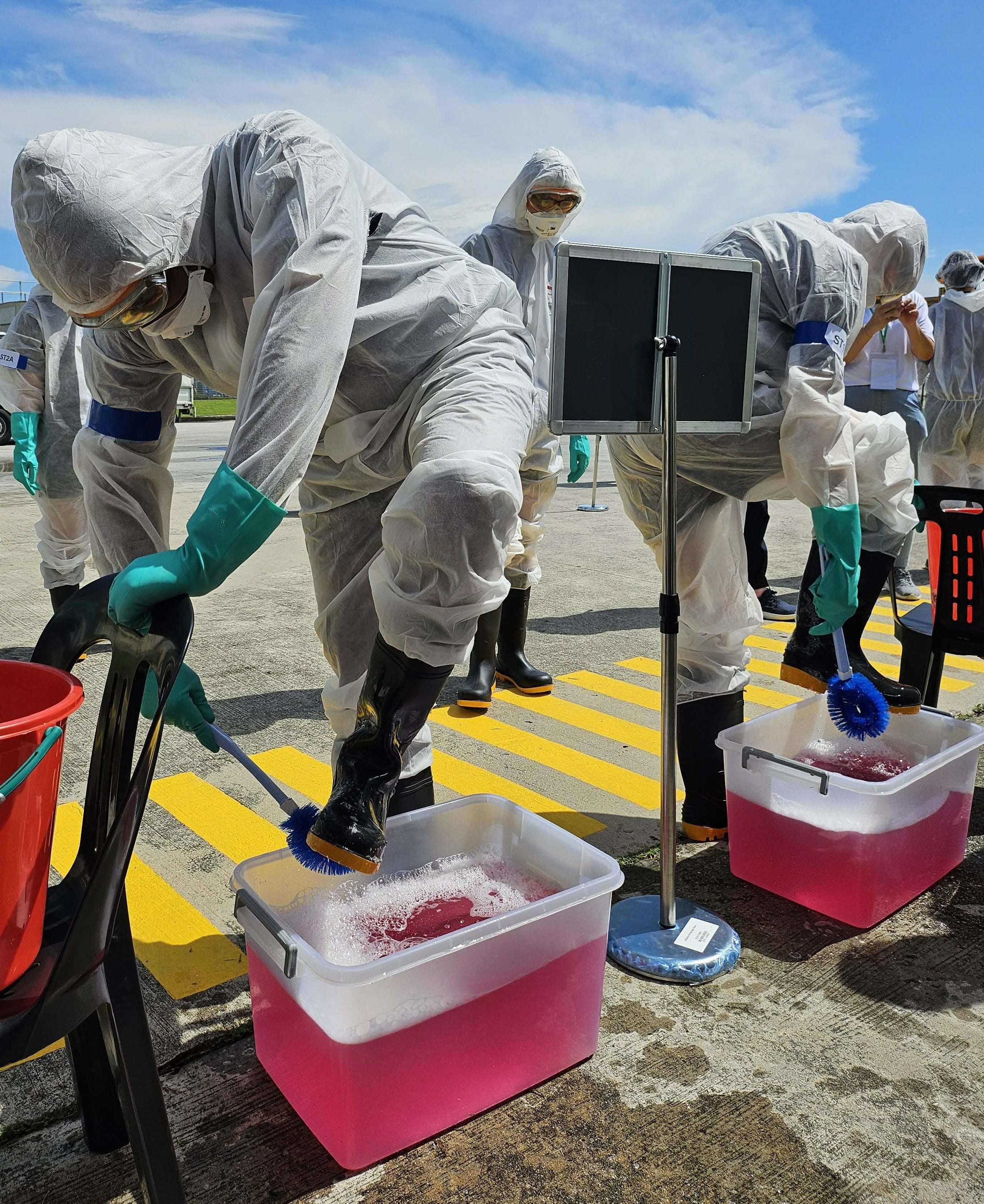 Personnel undergoing decontamination during simulated exercise_Credit AVS